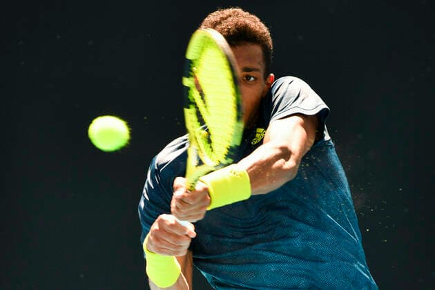 TENNIS AUSTRALIAN OPEN, Felix Auger Aliassime of Canada in action during his second Round Men s singles match against James Duckworth of Australia on Day 3 of the Australian Open at Melbourne Park in Melbourne, Wednesday, February 10, 2021. ( NO ARCHIVING, EDITORIAL USE ONLY, NO USE IN BOOKS WITHOUT CONSENT MELBOURNE VIC AUSTRALIA  Copyright: xJAMESxROSSx 20210210001519540272