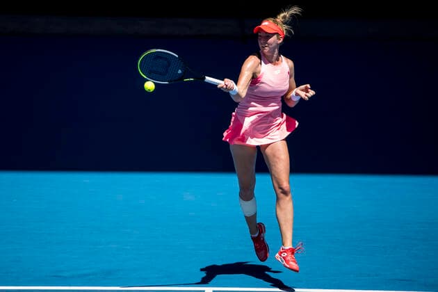 MELBOURNE, VIC - FEBRUARY 10: Nina Stojanovic of Serbia returns the ball during round 2 of the 2021 Australian Open on February 10 2020, at Melbourne Park in Melbourne, Australia. (Photo by Jason Heidrich Icon Sportswire) TENNIS: FEB 10 Australian Open Icon2102100813