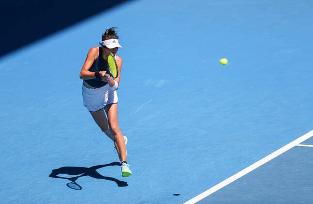 (210210) -- MELBOURNE, Feb. 10, 2021 -- Hsieh Su-Wei returns a shot during the women s singles second round match between Hsieh Su-Wei of Chinese Taipei and Bianca Andreescu of Canada at the Australian Open in Melbourne Park, Melbourne, Australia on Feb. 10, 2021. ) (SP)AUSTRALIA-MELBOURNE-TENNIS-AUSTRALIAN OPEN-DAY 3 BaixXuefei 