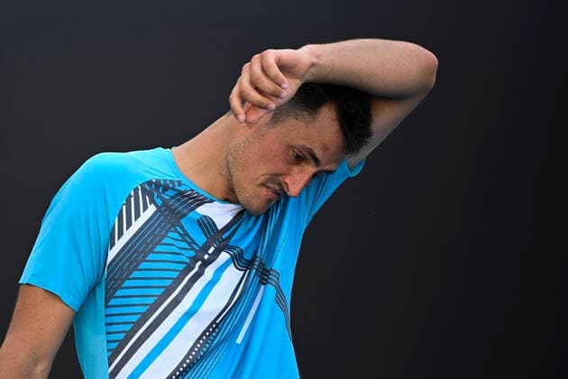 TENNIS AUSTRALIAN OPEN, Bernard Tomic of Australia reacts during his second Round Men s singles match against Denis Shapovalov of Canada on Day 3 of the Australian Open at Melbourne Park in Melbourne, Wednesday, February 10, 2021. ( NO ARCHIVING, EDITORIAL USE ONLY, NO USE IN BOOKS WITHOUT CONSENT MELBOURNE VIC AUSTRALIA  Copyright: xDEANxLEWINSx 20210210001519565422