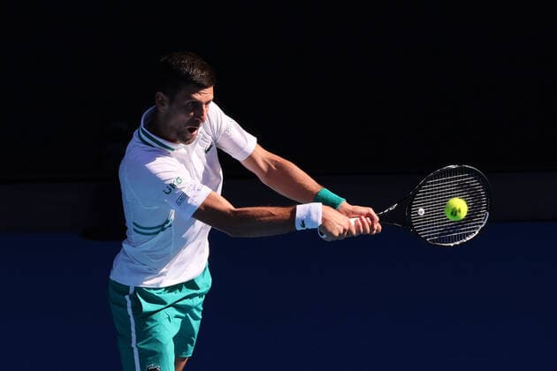February 10, 2021: 1st seed Novak DJOKOVIC of Serbia in action against Frances TIAFOE of the USA in a 2nd round match on day 3 of the 2021 Australian Open on Rod Laver Arena, in Melbourne, Australia. Cal Media. Melbourne Australia - ZUMAc04_ 20210210_zaf_c04_015 Copyright: xSydneyxLowx