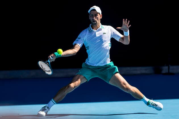 MELBOURNE, VIC - FEBRUARY 10: Novak Djokovic of Serbia returns the ball during round 2 of the 2021 Australian Open on February 10 2020, at Melbourne Park in Melbourne, Australia. (Photo by Jason Heidrich Icon Sportswire) TENNIS: FEB 10 Australian Open Icon2102100833
