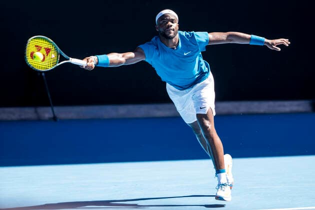 MELBOURNE, VIC - FEBRUARY 10: Frances Tiafoe of the United States of America returns the ball during round 2 of the 2021 Australian Open on February 10 2020, at Melbourne Park in Melbourne, Australia. (Photo by Jason Heidrich Icon Sportswire) TENNIS: FEB 10 Australian Open Icon2102100973