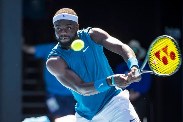 MELBOURNE, VIC - FEBRUARY 10: Frances Tiafoe of the United States of America returns the ball during round 2 of the 2021 Australian Open on February 10 2020, at Melbourne Park in Melbourne, Australia. (Photo by Jason Heidrich Icon Sportswire) TENNIS: FEB 10 Australian Open Icon2102101113