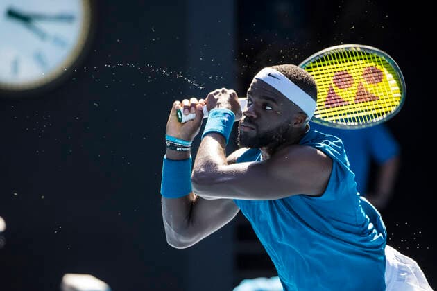 MELBOURNE, VIC - FEBRUARY 10: Frances Tiafoe of the United States of America returns the ball during round 2 of the 2021 Australian Open on February 10 2020, at Melbourne Park in Melbourne, Australia. (Photo by Jason Heidrich Icon Sportswire) TENNIS: FEB 10 Australian Open Icon2102101123