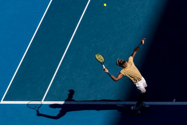 MELBOURNE, VIC - FEBRUARY 10: Frances Tiafoe of the United States of America serves the ball during round 2 of the 2021 Australian Open on February 10 2020, at Melbourne Park in Melbourne, Australia. (Photo by Jason Heidrich Icon Sportswire) TENNIS: FEB 10 Australian Open Icon2102101213