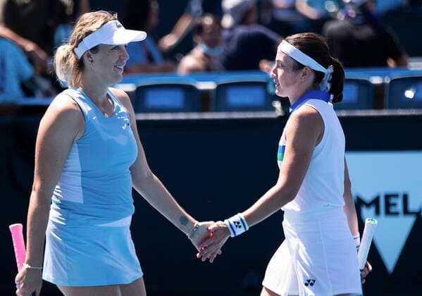 (210210) -- MELBOURNE, Feb. 10, 2021 -- Anastasia Pavlyuchenkova Anastasija Sevastova (R) react during the women s doubles first round match between Yang Zhaoxuan Xu Yifan of China and Russia s Anastasia Pavlyuchenkova Latvia s Anastasija Sevastova at the Australian Open in Melbourne Park, Melbourne, Australia on Feb. 10, 2021. (Photo by Hu Jingchen Xinhua) (SP)AUSTRALIA-MELBOURNE-TENNIS-AUSTRALIAN OPEN-DAY 3 BaixXuefeihujingchen 