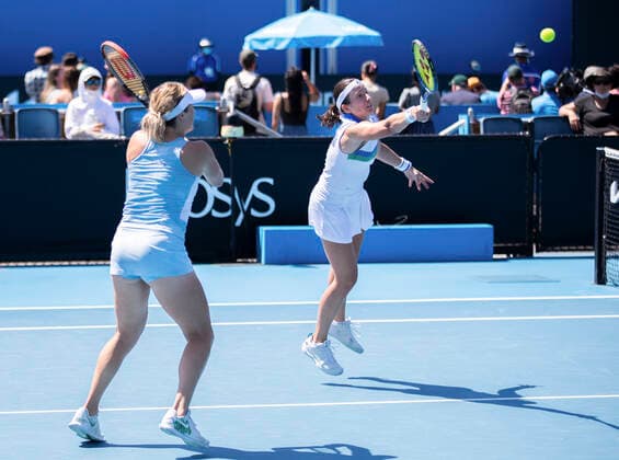 (210210) -- MELBOURNE, Feb. 10, 2021 -- Anastasia Pavlyuchenkova Anastasija Sevastova (R) compete during the women s doubles first round match between Yang Zhaoxuan Xu Yifan of China and Russia s Anastasia Pavlyuchenkova Latvia s Anastasija Sevastova at the Australian Open in Melbourne Park, Melbourne, Australia on Feb. 10, 2021. (Photo by Hu Jingchen Xinhua) (SP)AUSTRALIA-MELBOURNE-TENNIS-AUSTRALIAN OPEN-DAY 3 BaixXuefeihujingchen 