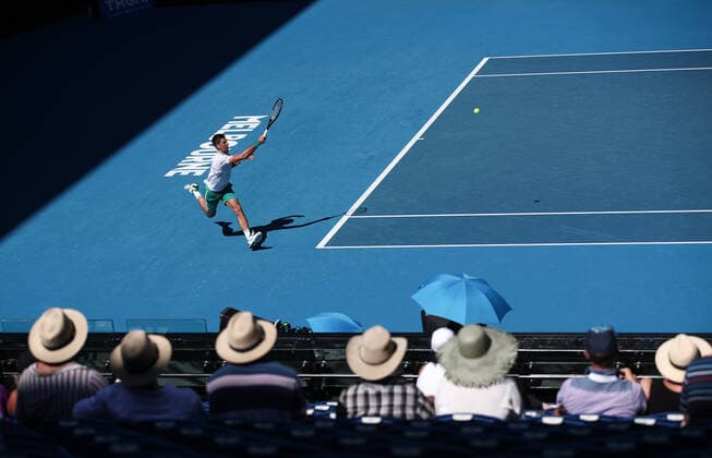 (210210) -- MELBOURNE, Feb. 10, 2021 -- Novak Djokovic of Serbia returns a shot during the men s singles second round match between Novak Djokovic of Serbia and Frances Tiafoe of the United States at the Australian Open in Melbourne Park, Melbourne, Australia, Feb. 10, 2021. ) (SP)AUSTRALIA-MELBOURNE-TENNIS-AUSTRALIAN OPEN-DAY 3 BaixXuefei 
