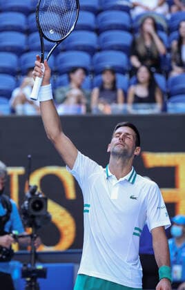 (210210) -- MELBOURNE, Feb. 10, 2021 -- Novak Djokovic of Serbia celebrates after winning the men s singles second round match between Novak Djokovic of Serbia and Frances Tiafoe of the United States at the Australian Open in Melbourne Park, Melbourne, Australia, Feb. 10, 2021. ) (SP)AUSTRALIA-MELBOURNE-TENNIS-AUSTRALIAN OPEN-DAY 3 BaixXuefei 