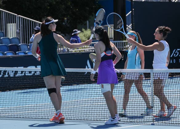 (210210) -- MELBOURNE, Feb. 10, 2021 -- Zheng Saisai (2nd L) Duan Yingying (1st L) greet Aleksandra Krunic (2nd R) Martina Trevisan after the women s doubles first round match between China s Zheng Saisai Duan Yingying and Serbia s Aleksandra Krunic Italy s Martina Trevisan at the Australian Open in Melbourne Park, Melbourne, Australia on Feb. 10, 2021. (Photo by Xinhua) (SP)AUSTRALIA-MELBOURNE-TENIS-AUSTRALIAN OPEN-DAY 3 HuxJingchen 