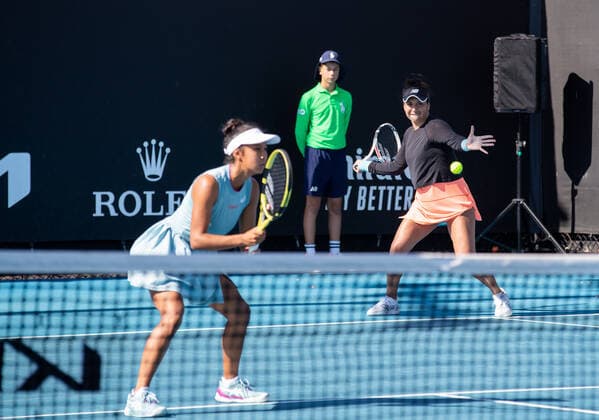 (210210) -- MELBOURNE, Feb. 10, 2021 -- Leylah Annie Fernandez (L) Heather Watson compete during the women s doubles first round match between Canada s Leylah Annie Fernandez Britain s Heather Watson and China s Zhang Shuai Australia s Samantha Stosur at the Australian Open in Melbourne Park, Melbourne, Australia on Feb. 10, 2021. (Photo by Xinhua) (SP)AUSTRALIA-MELBOURNE-TENNIS-AUSTRALIAN OPEN-DAY 3 HuxJingchen 