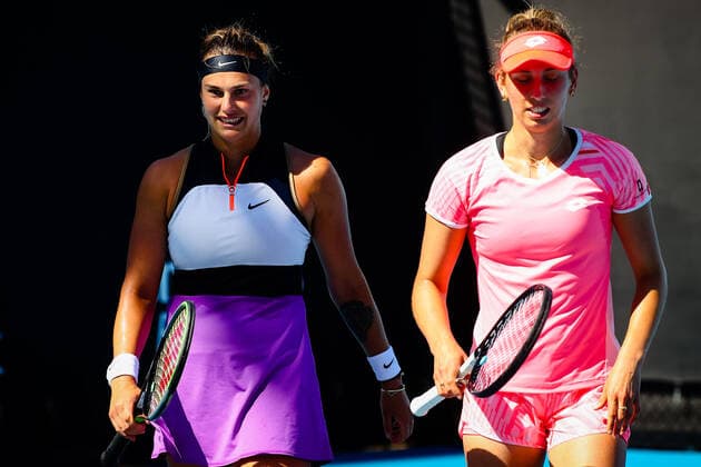 Belarussian Aryna Sabalenka and Belgian Elise Mertens pictured during a tennis match between the Belgian-Swedish pair Van Uytvank and Lister and the Belgian-Belarus pair Mertens and Sabalenka, in the first round of the women s doubles competition of the Australian Open tennis Grand Slam, Wednesday 10 February 2021 in Melbourne Park, Melbourne, Australia. Mertens-Sabalenka won in three sets. The 2021 edition of the Australian Grand Slam has been delayed by three week because of the ongoing pandemic. PATRICKxHAMILTON  x2641242x