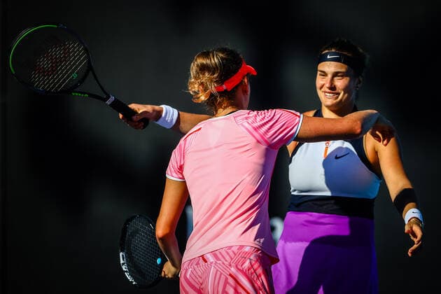 Belarussian Aryna Sabalenka (R) and Belgian Elise Mertens pictured during a tennis match between the Belgian-Swedish pair Van Uytvank and Lister and the Belgian-Belarus pair Mertens and Sabalenka, in the first round of the women s doubles competition of the Australian Open tennis Grand Slam, Wednesday 10 February 2021 in Melbourne Park, Melbourne, Australia. The 2021 edition of the Australian Grand Slam has been delayed by three week because of the ongoing pandemic. PATRICKxHAMILTON  x2641260x
