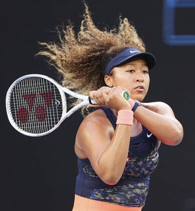 Tennis: Australian Open Naomi Osaka of Japan plays on her way to a 6-2, 6-3 victory over France s Caroline Garcia in the second round of the Australian Open in Melbourne on Feb. 10, 2021. 