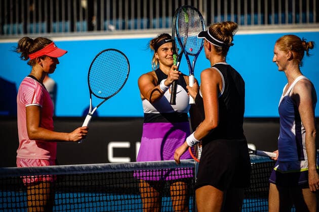 L-R, Belgian Elise Mertens, Belarussian Aryna Sabalenka won over Swedish Cornelia Lister and Belgian Alison Van Uytvanck at a tennis match between the Belgian-Swedish pair Van Uytvank and Lister and the Belgian-Belarus pair Mertens and Sabalenka, in the first round of the women s doubles competition of the Australian Open tennis Grand Slam, Wednesday 10 February 2021 in Melbourne Park, Melbourne, Australia. The 2021 edition of the Australian Grand Slam has been delayed by three week because of the ongoing pandemic. PATRICKxHAMILTON  x2641288x