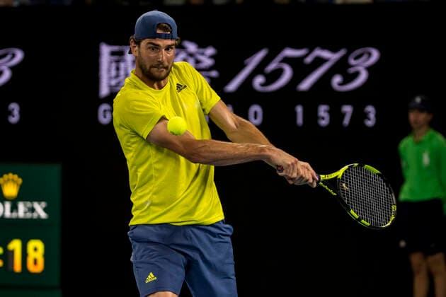 MELBOURNE, VIC - FEBRUARY 10: Maxime Cressy of the United States of America returns the ball during round 2 of the 2021 Australian Open on February 10 2020, at Melbourne Park in Melbourne, Australia. (Photo by Jason Heidrich Icon Sportswire) TENNIS: FEB 10 Australian Open Icon2102101863