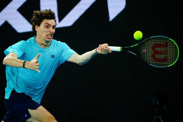 French Ugo Humbert pictured in action during a tennis match between French Humbert and Australian Kyrgios, in the secound round of the men s singles competition of the Australian Open tennis Grand Slam, Wednesday 10 February 2021 in Melbourne Park, Melbourne, Australia. The 2021 edition of the Australian Grand Slam has been delayed by three week because of the ongoing pandemic. PATRICKxHAMILTON  x2641380x