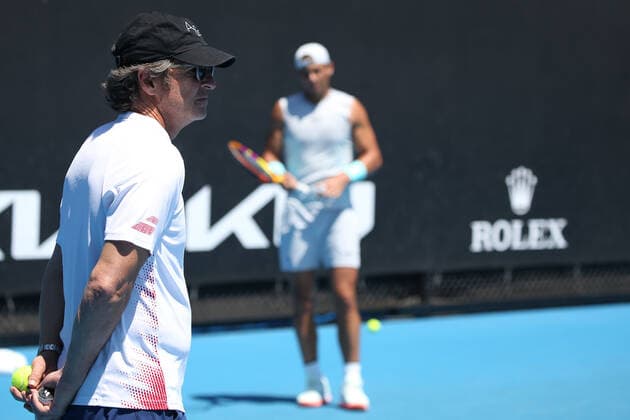 Francisco Roig, ESP, practising with Rafael Nadal on day three of 2021 Australian Open in Melbourne, 10 02 2021