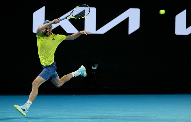 (210210) -- MELBOURNE, Feb. 10, 2021 -- Maxime Cressy of the United States returns a shot during the men s singles match against Alexander Zverev of Germany at Australian Open in Melbourne Park, in Melbourne, Australia, on Feb. 10, 2021. ) (SP)AUSTRALIA-MELBOURNE-TENNIS-AUSTRALIAN OPEN-DAY 3 BaixXuefei 