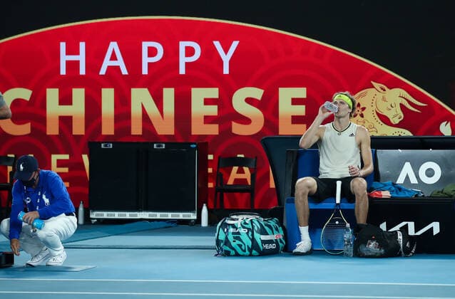 (210210) -- MELBOURNE, Feb. 10, 2021 -- Alexander Zverev of Germany rests during the men s singles match against Maxime Cressy of the United States at Australian Open in Melbourne Park, in Melbourne, Australia, on Feb. 10, 2021. ) (SP)AUSTRALIA-MELBOURNE-TENNIS-AUSTRALIAN OPEN-DAY 3 BaixXuefei 