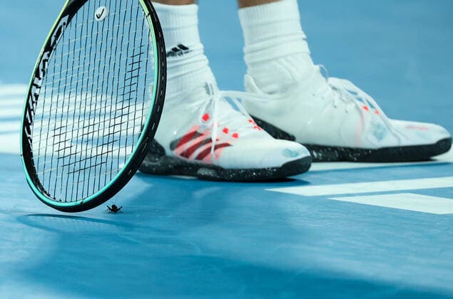 (210210) -- MELBOURNE, Feb. 10, 2021 -- Alexander Zverev of Germany touches a cricket with his racket during the men s singles match against Maxime Cressy of the United States at Australian Open in Melbourne Park, in Melbourne, Australia, on Feb. 10, 2021. ) (SP)AUSTRALIA-MELBOURNE-TENNIS-AUSTRALIAN OPEN-DAY 3 BaixXuefei 