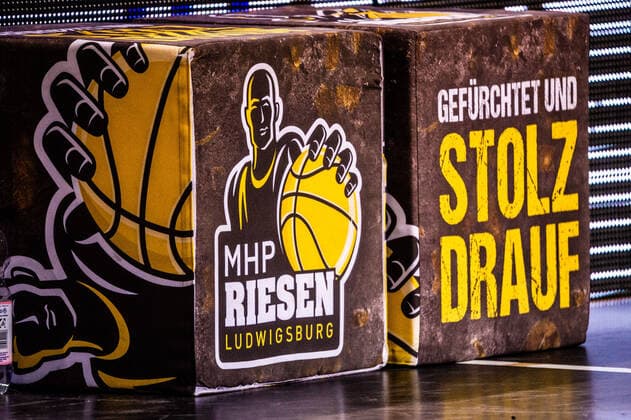 Logo MHP Riesen seat cube ãGefuerchtet Und Stolz DraufÒ 1 BASKETBALL Bundesliga MHP Riesen Ludwigsburg Basketball Loewen Braunschweig on 10 02 2021 in Ludwigsburg MHPArena , Baden Wuerttemberg, Germany at the game in the Basketball Bundesliga, MHP Riesen Ludwigsburg Basketball Loewen Braunschweig Ludwigsburg 10 02 21 Basketball , 10 02 2021, Ludwigsburg Germany xpxsdx