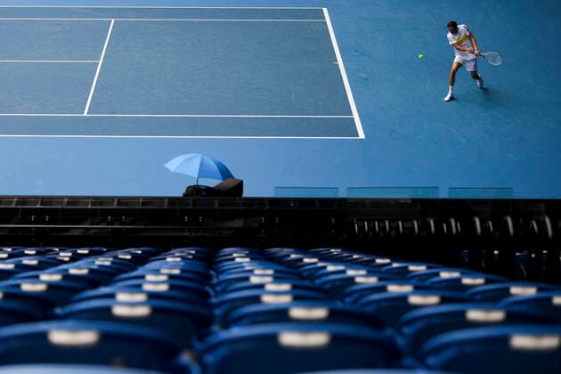 TENNIS VICTORIA CORONAVIRUS COVID19, Daniil Medvedev of Russia plays a shot in front of empty stands during his third Round Men s singles match against Filip Krajinovic of Serbia on Day 6 of the Australian Open at Melbourne Park in Melbourne, Saturday, February 13, 2021. The Australian Open proceeds without crowds after Victoria was sent into a five day lockdown after a surge of COVID-19 cases in Melbourne. ( NO ARCHIVING, EDITORIAL USE ONLY, NO USE IN BOOKS WITHOUT CONSENT MELBOURNE VIC AUSTRALIA  Copyright: xJAMESxROSSx 20210213001520240411