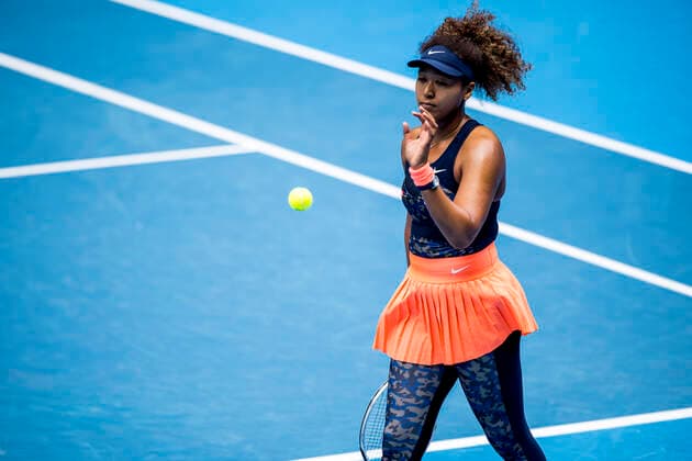 MELBOURNE, VIC - FEBRUARY 14: Naomi Osaka of Japan prepares to serve during round 4 of the 2021 Australian Open on February 14 2020, at Melbourne Park in Melbourne, Australia. (Photo by Jason Heidrich Icon Sportswire) TENNIS: FEB 14 Australian Open Icon2102140277