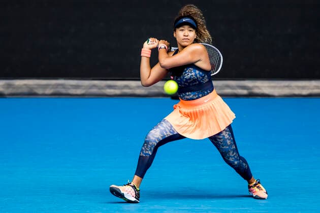 MELBOURNE, VIC - FEBRUARY 14: Naomi Osaka of Japan returns the ball during round 4 of the 2021 Australian Open on February 14 2020, at Melbourne Park in Melbourne, Australia. (Photo by Jason Heidrich Icon Sportswire) TENNIS: FEB 14 Australian Open Icon2102140567