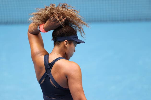 (210214) -- MELBOURNE, Feb. 14, 2021 -- Osaka Naomi reacts during the women s singles 4th round match between Osaka Naomi of Japan and Garbine Muguruza of Spain at the Australian Open 2021 tennis tournament in Melbourne Park, Melbourne, Australia, on Feb. 14, 2021. ) (SP)AUSTRALIA-MELBOURNE-TENNIS-AUSTRALIAN OPEN-DAY 7 BaixXuefei 