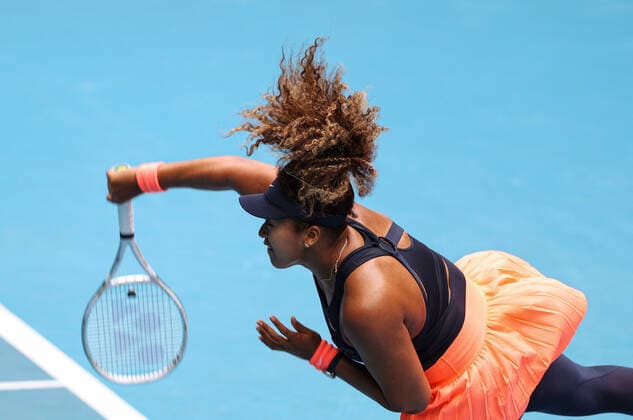 (210214) -- MELBOURNE, Feb. 14, 2021 -- Osaka Naomi serves the ball during the women s singles 4th round match between Osaka Naomi of Japan and Garbine Muguruza of Spain at the Australian Open 2021 tennis tournament in Melbourne Park, Melbourne, Australia, on Feb. 14, 2021. ) (SP)AUSTRALIA-MELBOURNE-TENNIS-AUSTRALIAN OPEN-DAY 7 BaixXuefei 
