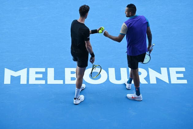 TENNIS AUSTRALIAN OPEN, Nick Kyrgios (L) and Thanasi Kokkinakis of Australia in action during their second Round Men s doubles match against Lukasz Kubot of Poland and Wesley Koolhof of the Netherlands on Day 7 of the Australian Open at Melbourne Park in Melbourne, Sunday, February 14, 2021. ( NO ARCHIVING, EDITORIAL USE ONLY, NO USE IN BOOKS WITHOUT CONSENT MELBOURNE VIC AUSTRALIA  Copyright: xDEANxLEWINSx 20210214001520493004