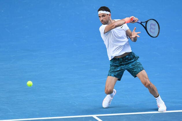 TENNIS AUSTRALIAN OPEN, Grigor Dimitrov of Bulgaria in action during his fourth Round Men s singles match against Dominic Thiem of Austria on Day 7 of the Australian Open at Melbourne Park in Melbourne, Sunday, February 14, 2021. ( NO ARCHIVING, EDITORIAL USE ONLY, NO USE IN BOOKS WITHOUT CONSENT MELBOURNE VIC AUSTRALIA  Copyright: xDAVExHUNTx 20210214001520496127