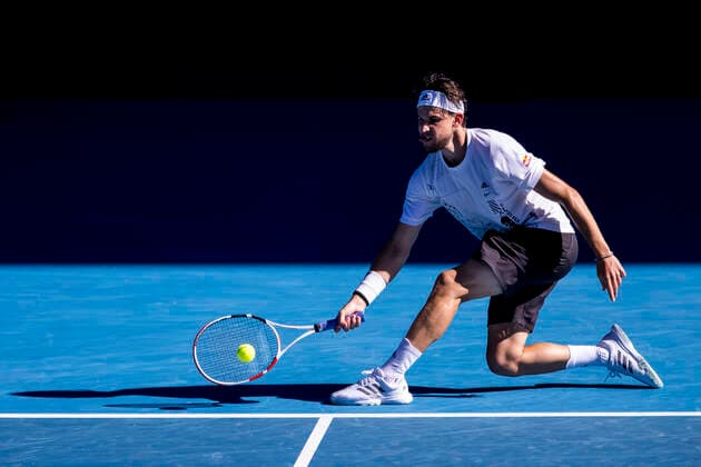 MELBOURNE, VIC - FEBRUARY 14: Dominic Thiem of Austria returns the ball during round 4 of the 2021 Australian Open on February 14 2020, at Melbourne Park in Melbourne, Australia. (Photo by Jason Heidrich Icon Sportswire) TENNIS: FEB 14 Australian Open Icon2102141117