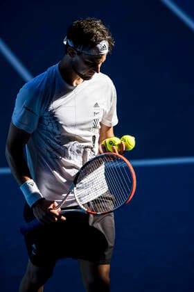 MELBOURNE, VIC - FEBRUARY 14: Dominic Thiem of Austria prepares to serve during round 4 of the 2021 Australian Open on February 14 2020, at Melbourne Park in Melbourne, Australia. (Photo by Jason Heidrich Icon Sportswire) TENNIS: FEB 14 Australian Open Icon2102141257