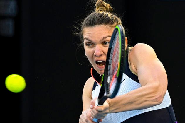 TENNIS AUSTRALIAN OPEN, Simona Halep of Romania in action during her fourth Round Women s singles match against Iga Swiatek of Poland on Day 7 of the Australian Open at Melbourne Park in Melbourne, Sunday, February 14, 2021. ( NO ARCHIVING, EDITORIAL USE ONLY, NO USE IN BOOKS WITHOUT CONSENT MELBOURNE VIC AUSTRALIA  Copyright: xDEANxLEWINSx 20210214001520499616