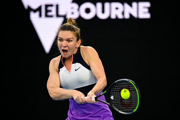 TENNIS AUSTRALIAN OPEN, Simona Halep of Romania in action during her fourth Round Women s singles match against Iga Swiatek of Poland on Day 7 of the Australian Open at Melbourne Park in Melbourne, Sunday, February 14, 2021. ( NO ARCHIVING, EDITORIAL USE ONLY, NO USE IN BOOKS WITHOUT CONSENT MELBOURNE VIC AUSTRALIA  Copyright: xDEANxLEWINSx 20210214001520503662