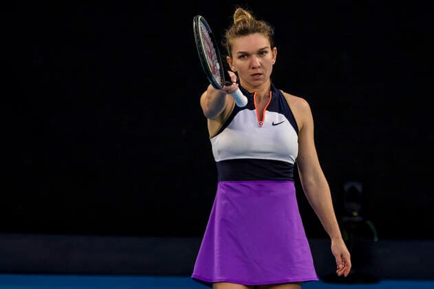 MELBOURNE, VIC - FEBRUARY 14: Simona Halep of Romania shows her frustration after losing a game during round 4 of the 2021 Australian Open on February 14 2020, at Melbourne Park in Melbourne, Australia. (Photo by Jason Heidrich Icon Sportswire) TENNIS: FEB 14 Australian Open Icon2102141777