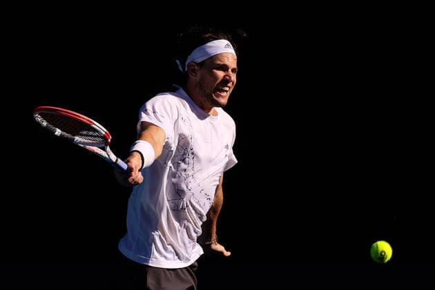 February 14, 2021: 3rd seed Dominic THIEM of Austria in action against 18th seed Grigor DIMITROV of Bulgaria in a 4th round match on day 7 of the 2021 Australian Open on Rod Laver Arena, in Melbourne, Australia. Cal Media. Melbourne Australia - ZUMAc04_ 20210214_zaf_c04_039 Copyright: xSydneyxLowx