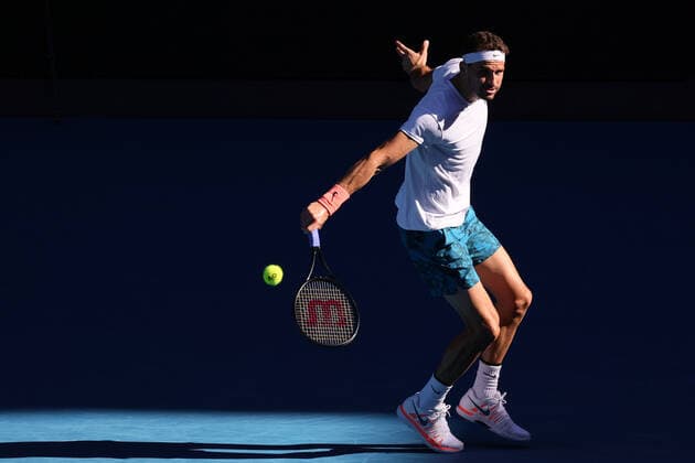 February 14, 2021: 18th seed Grigor DIMITROV of Bulgaria in action against 3rd seed Dominic THIEM of Austria in a 4th round match on day 7 of the 2021 Australian Open on Rod Laver Arena, in Melbourne, Australia. Cal Media. Melbourne Australia - ZUMAc04_ 20210214_zaf_c04_053 Copyright: xSydneyxLowx