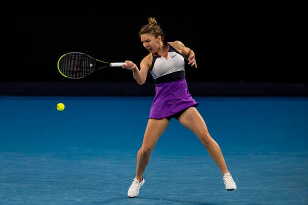 MELBOURNE, VIC - FEBRUARY 14: Simona Halep of Romania returns the ball during round 4 of the 2021 Australian Open on February 14 2020, at Melbourne Park in Melbourne, Australia. (Photo by Jason Heidrich Icon Sportswire) TENNIS: FEB 14 Australian Open Icon2102141827
