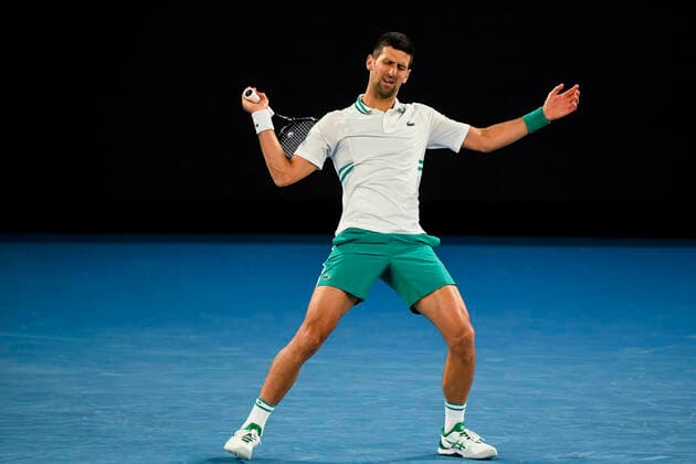TENNIS AUSTRALIAN OPEN, Novak Djokovic of Serbia reacts during his fourth Round Men s singles match against Milos Raonic of Canada on Day 7 of the Australian Open at Melbourne Park in Melbourne, Sunday, February 14, 2021. ( NO ARCHIVING, EDITORIAL USE ONLY, NO USE IN BOOKS WITHOUT CONSENT MELBOURNE VIC AUSTRALIA  Copyright: xDAVExHUNTx 20210214001520523211