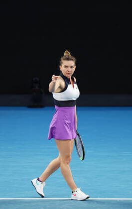 (210214) -- MELBOURNE, Feb. 14, 2021 -- Simona Halep reacts during the women s singles 4th round match between Simona Halep of Romania and Iga Swiatek of Poland at the Australian Open 2021 tennis tournament in Melbourne Park, Melbourne, Australia, on Feb. 14, 2021. ) (SP)AUSTRALIA-MELBOURNE-TENNIS-AUSTRALIAN OPEN-DAY 7 BaixXuefei 