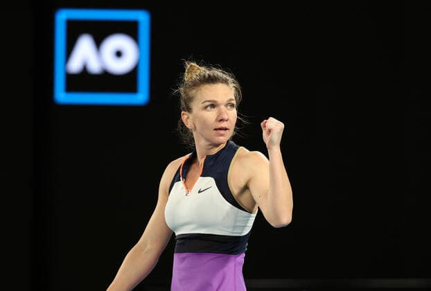 (210214) -- MELBOURNE, Feb. 14, 2021 -- Simona Halep reacts during the women s singles 4th round match between Simona Halep of Romania and Iga Swiatek of Poland at the Australian Open 2021 tennis tournament in Melbourne Park, Melbourne, Australia, on Feb. 14, 2021. ) (SP)AUSTRALIA-MELBOURNE-TENNIS-AUSTRALIAN OPEN-DAY 7 BaixXuefei 