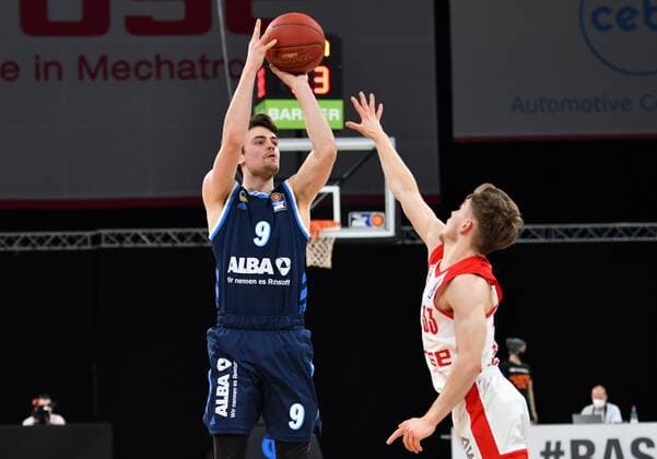 BAMBERG 14 02 2021 Basketball easycredit 1 Basketball Bundesliga 19 matchday Brose Bamberg vs Alba Berlin Jonas Mattisseck 9, Alba Berlin throws against Bennet Hundt 33, Brose Bamberg photo Hans Martin Issler isslerimages Brose Bamberg vs Alba Berlin
