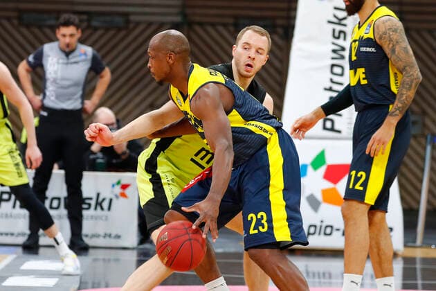 19 Matchday of the easyCredit BBL Basketball Bundesliga at Oberfrankenhalle in Bayreuth Bavaria Germany Season 2020 2021 Medi Bayreuth vs EWE Baskets Oldenburg Osvaldas Olisevicius Medi Bayreuth 31 right Rickey Paulding EWE Baskets Oldenburg 23 left