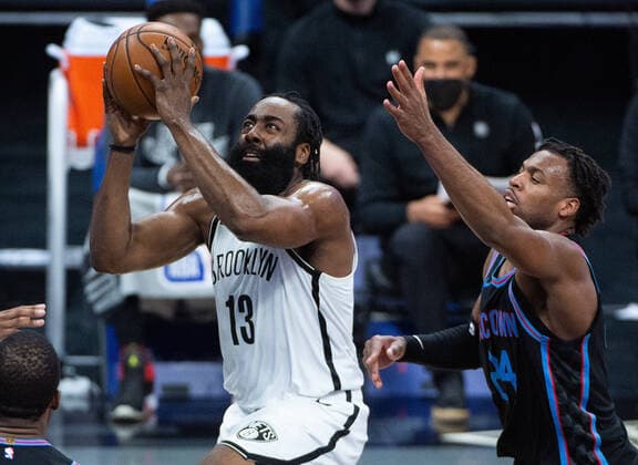 February 15, 2021, Sacramento, CA, USA: Brooklyn Nets guard James Harden (13) drives to basket past Sacramento Kings guard Buddy Hield (24) in the second quarter during a game at Golden 1 Center on Monday, Feb. 15, 2021 in Sacramento. Sacramento USA - ZUMAj89_ 20210215_zaf_j89_010 Copyright: xPaulxKitagakixJr.x