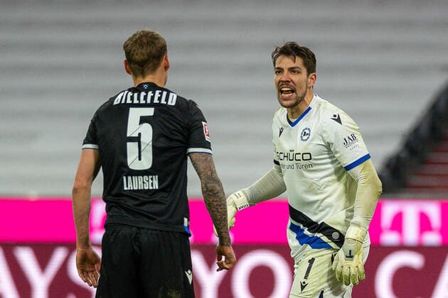 GER, FC Bayern Muechen vs Arminia Bielefeld, Football, Bundesliga, 21 Matchday, Season 2020 2021, 15 02 2021 Jacob Laursen DSC Arminia Bielefeld 05 , Stefan Ortega Moreno DSC Arminia Bielefeld 01 , GER, FC Bayern Muechen vs Arminia Bielefeld, Football, Bundesliga, 21 Spieltag, Saison 2020 2021, 15 02 2021, DFB DFL regulations prohibit any use of photographs as image sequences and or quasi video , Foto EIBNER Sascha Walther POOL Muenchen Allianz Arena Bayern Germany Poolfoto EIBNER Sascha Walther ,EDITORIAL USE ONLY