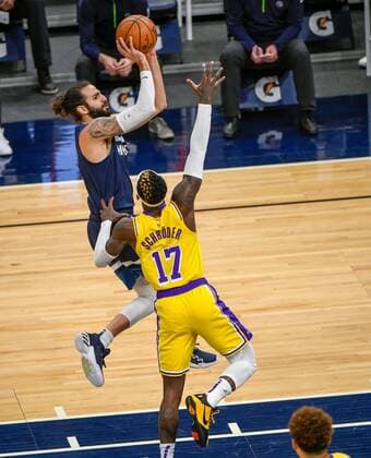 Minnesota Timberwolves guard Ricky Rubio (9) takes a shot over Los Angeles Lakers guard Dennis Schroder during first half of the NBA, Basketball Herren, USA basketball game between the Los Angeles Lakers and the Minnesota Timberwolves at Target Center in Minneapolis, Minnesota, USA, 16 February 2021. Los Angeles Lakers vs. Minnesota Timberwolves !ACHTUNG: NUR REDAKTIONELLE NUTZUNG!  Copyright: xCRAIGxLASSIGx AME6239 20210217-637491277724420043